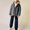 Giacca a vento con cappuccio effetto shearling Giacca a vento con cappuccio effetto shearling