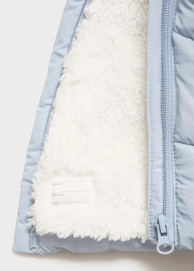 Giacca a vento con cappuccio effetto shearling Giacca a vento con cappuccio effetto shearling