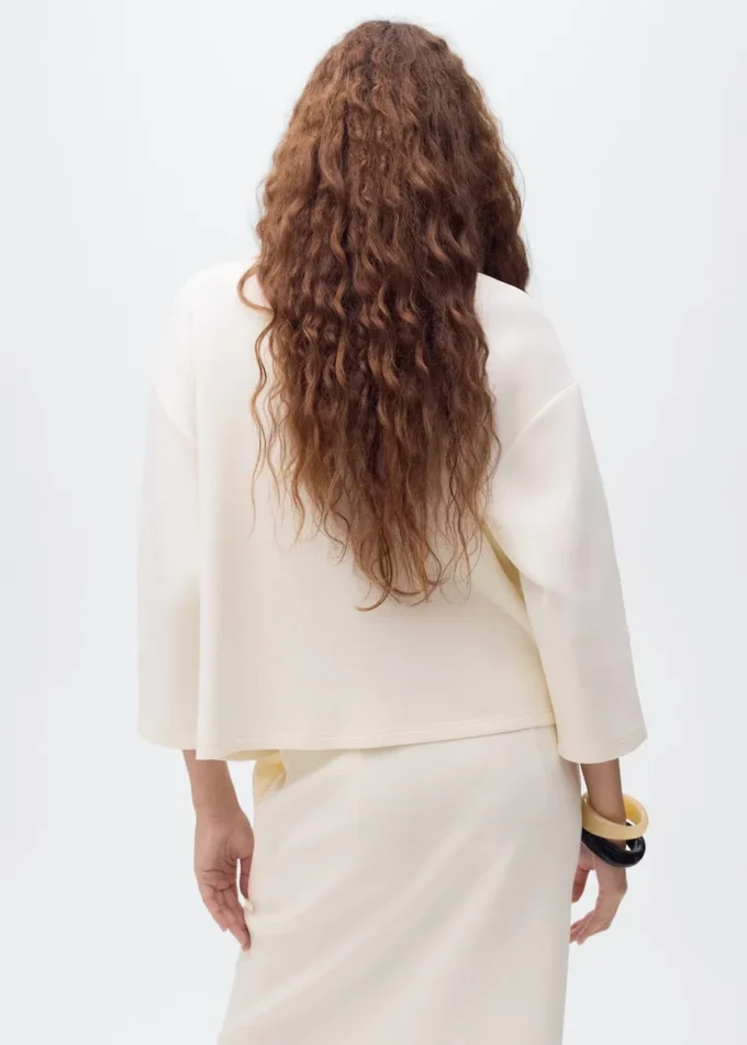 Giacca con maniche a tre quarti e tasche Giacca con maniche a tre quarti e tasche