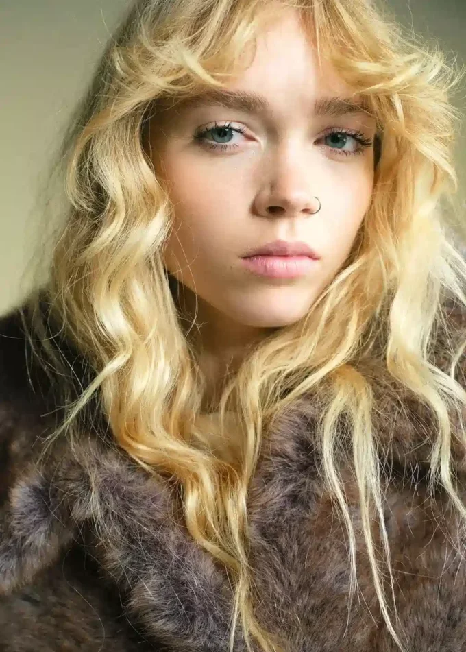 Giacca corta in pelliccia sintetica Giacca corta in pelliccia sintetica