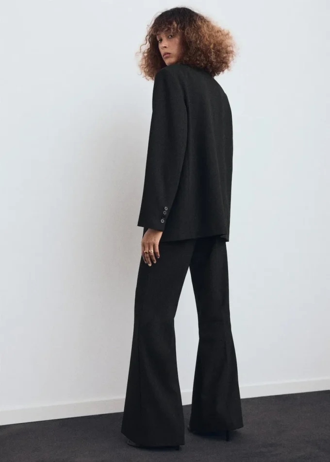 Giacca da completo con tasche con patta Giacca da completo con tasche con patta