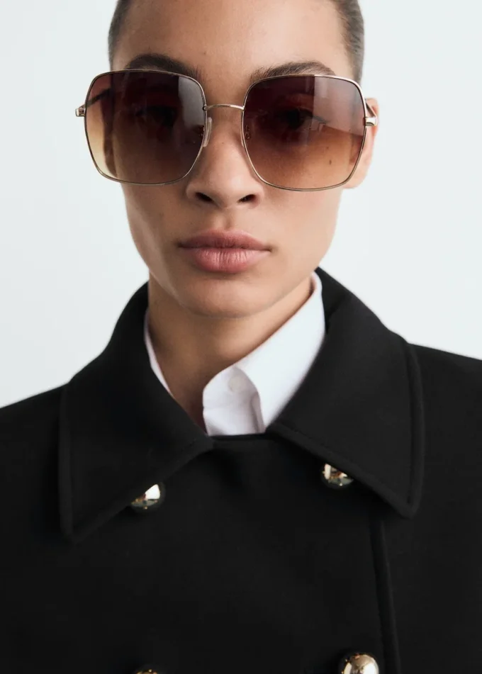 Giacca doppiopetto con revers Giacca doppiopetto con revers