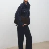 Giacca in denim aderente con tasche Giacca in denim aderente con tasche