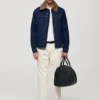 Giacca in denim con fodera in shearling Giacca in denim con fodera in shearling