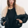Giacca in ecopelle con collo in shearling