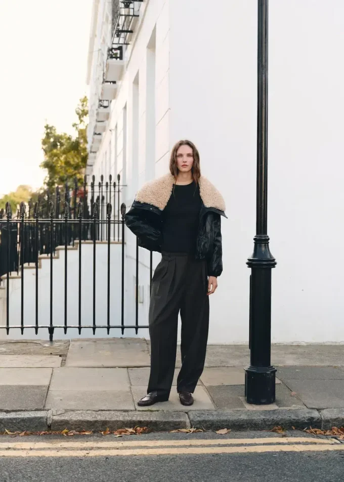 Giacca in ecopelle con collo in shearling