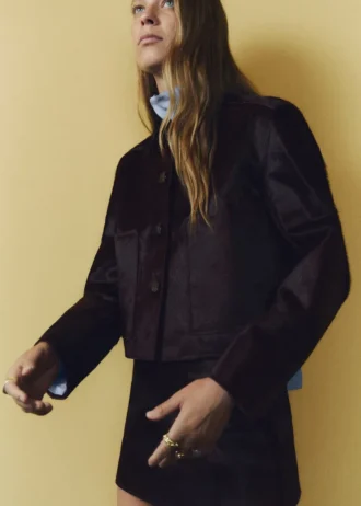 Giacca in pelle con tasche in pelliccia