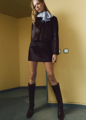 Giacca in pelle con tasche in pelliccia