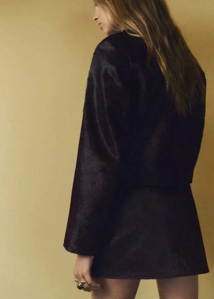 Giacca in pelle con tasche in pelliccia Giacca in pelle con tasche in pelliccia