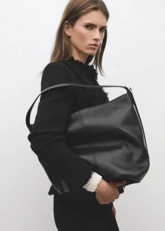 Giacca in tweed con bordi sfrangiati