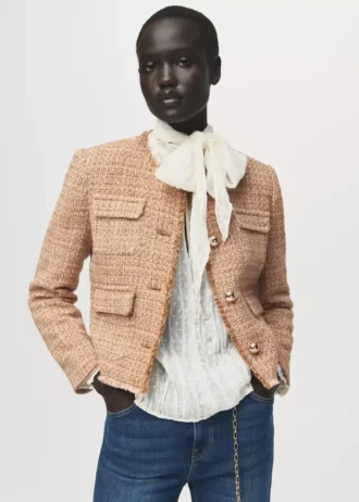 Giacca in tweed con bordi sfrangiati