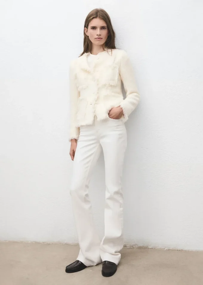 Giacca in tweed con bordi sfrangiati Giacca in tweed con bordi sfrangiati