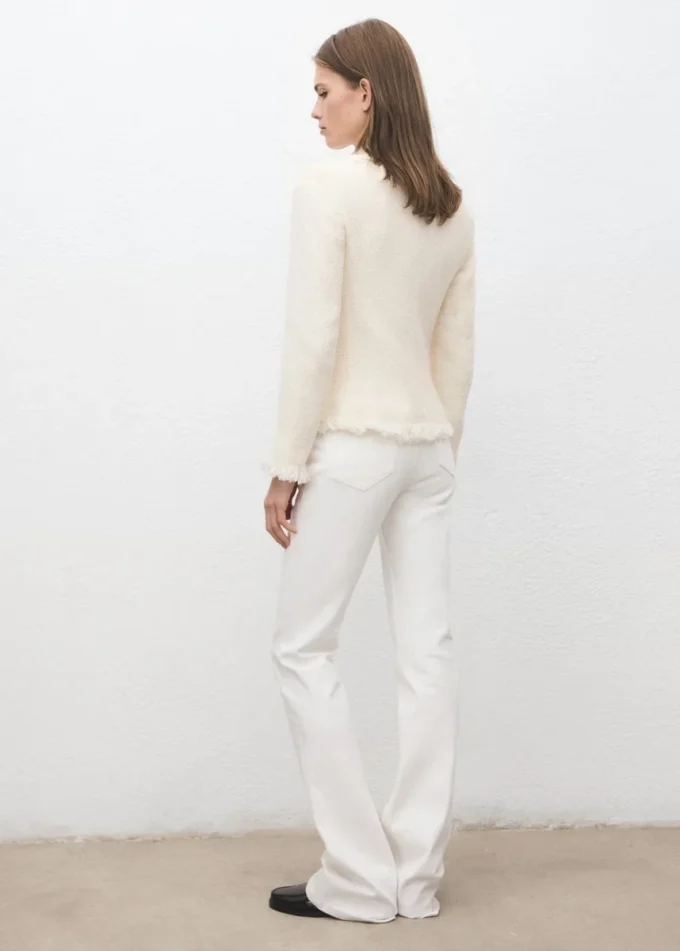 Giacca in tweed con bordi sfrangiati Giacca in tweed con bordi sfrangiati