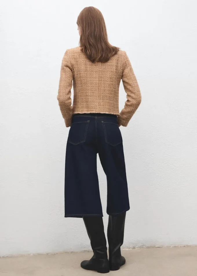 Giacca in tweed con bordi sfrangiati Giacca in tweed con bordi sfrangiati