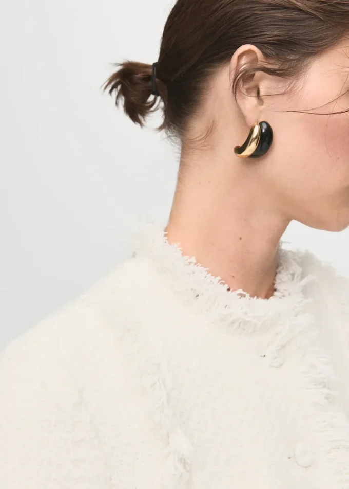 Giacca in tweed con bordi sfrangiati Giacca in tweed con bordi sfrangiati