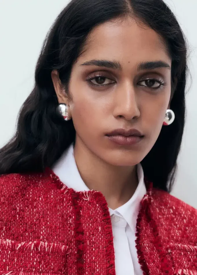 Giacca in tweed con bordi sfrangiati