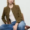 Giacca in tweed con bottoni gioiello Giacca in tweed con bottoni gioiello
