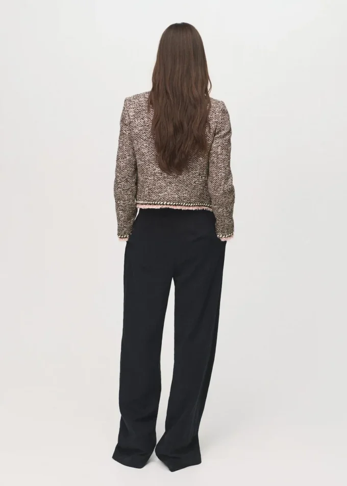 Giacca in tweed con tasche Giacca in tweed con tasche