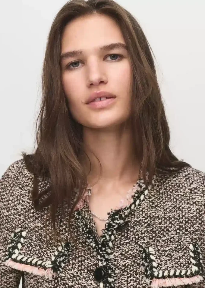 Giacca in tweed con tasche Giacca in tweed con tasche