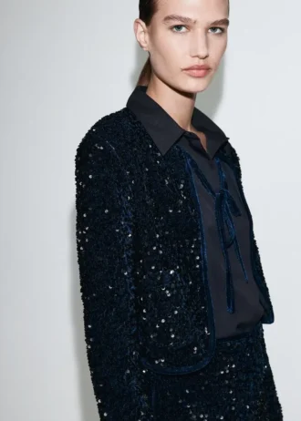 Giacca in velluto con paillettes e fiocco