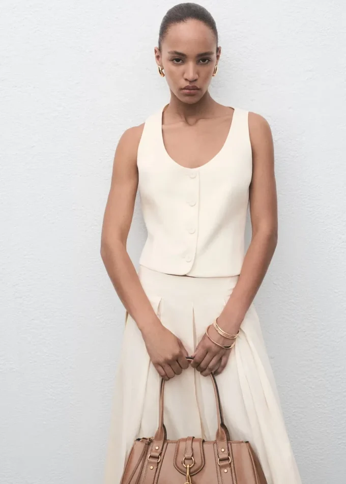 Gilet con bottoni Gilet con bottoni