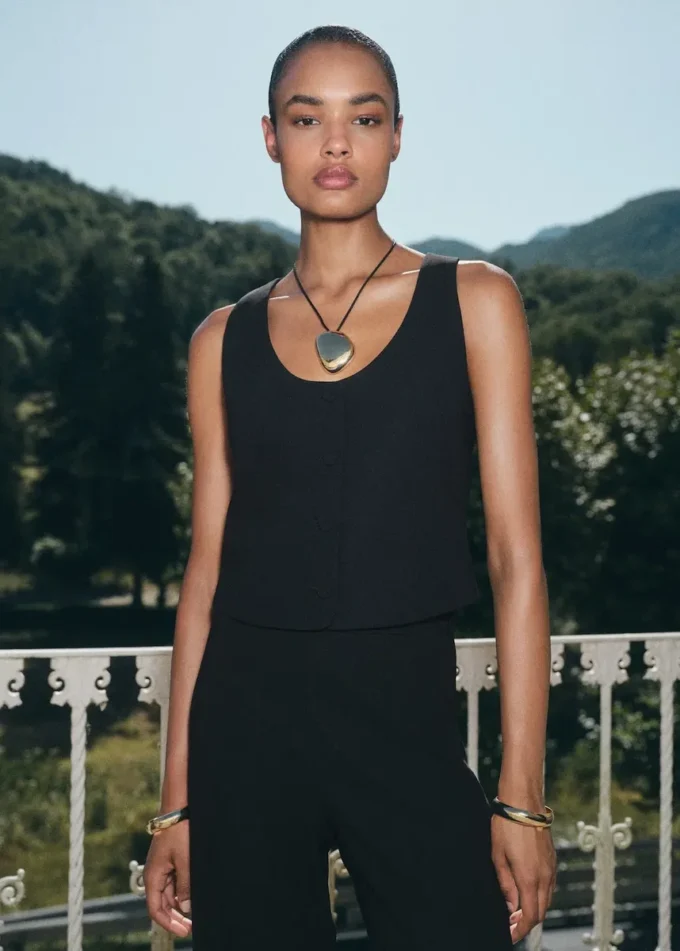 Gilet con bottoni Gilet con bottoni