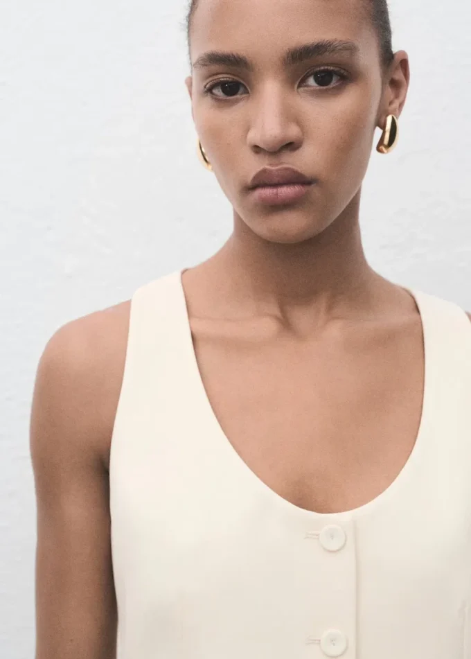 Gilet con bottoni Gilet con bottoni