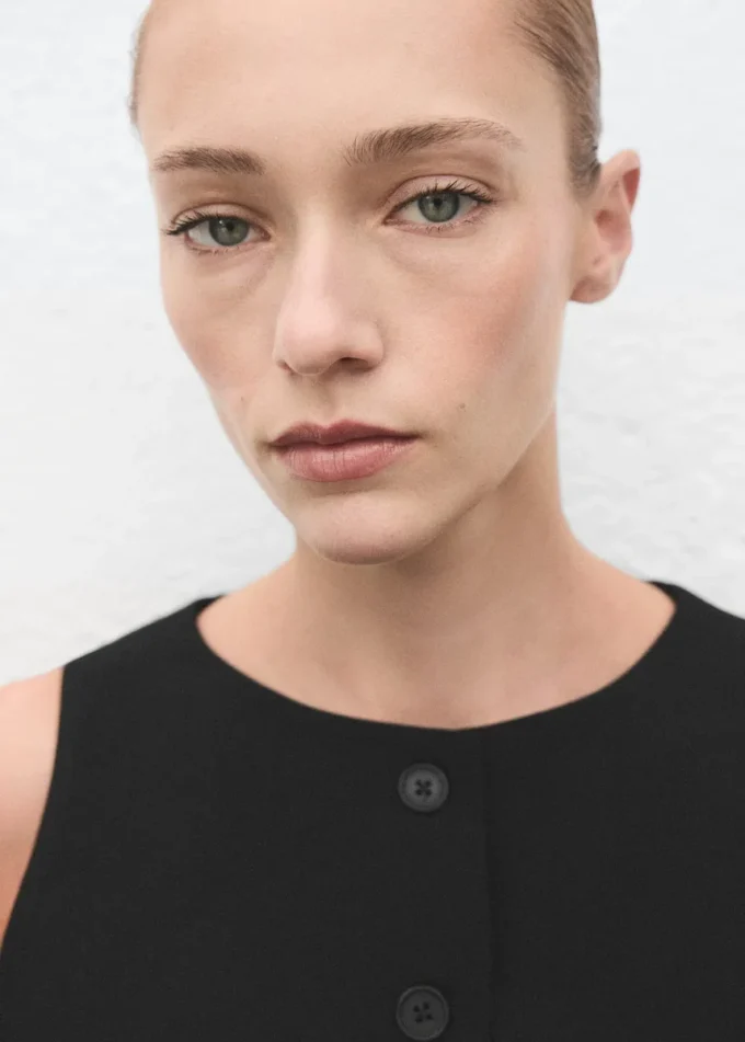 Gilet con bottoni Gilet con bottoni