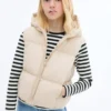 Gilet trapuntato con cappuccio Gilet trapuntato con cappuccio