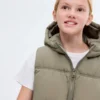 Gilet trapuntato con cappuccio Gilet trapuntato con cappuccio