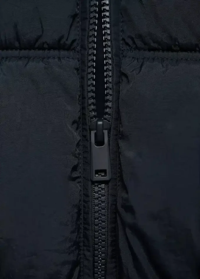 Gilet trapuntato con cappuccio Gilet trapuntato con cappuccio