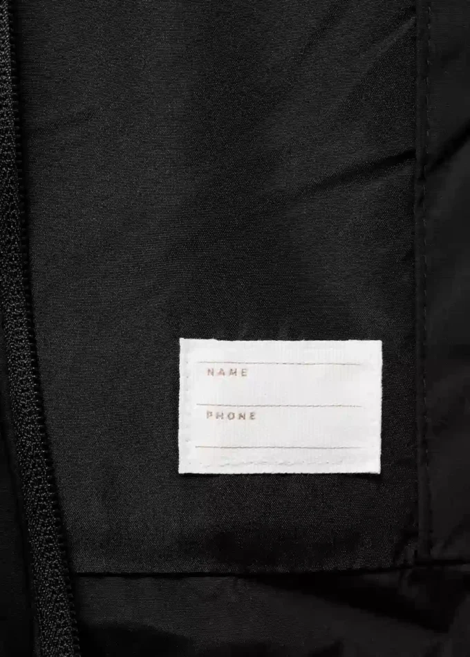 Gilet trapuntato con cappuccio Gilet trapuntato con cappuccio