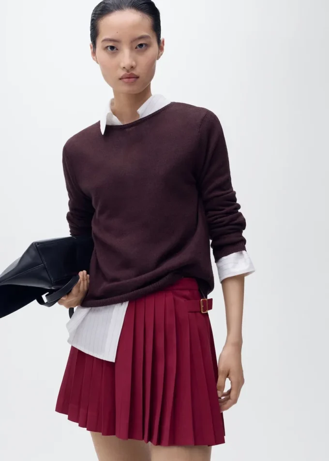 Gonna a pieghe con fibbie Gonna a pieghe con fibbie