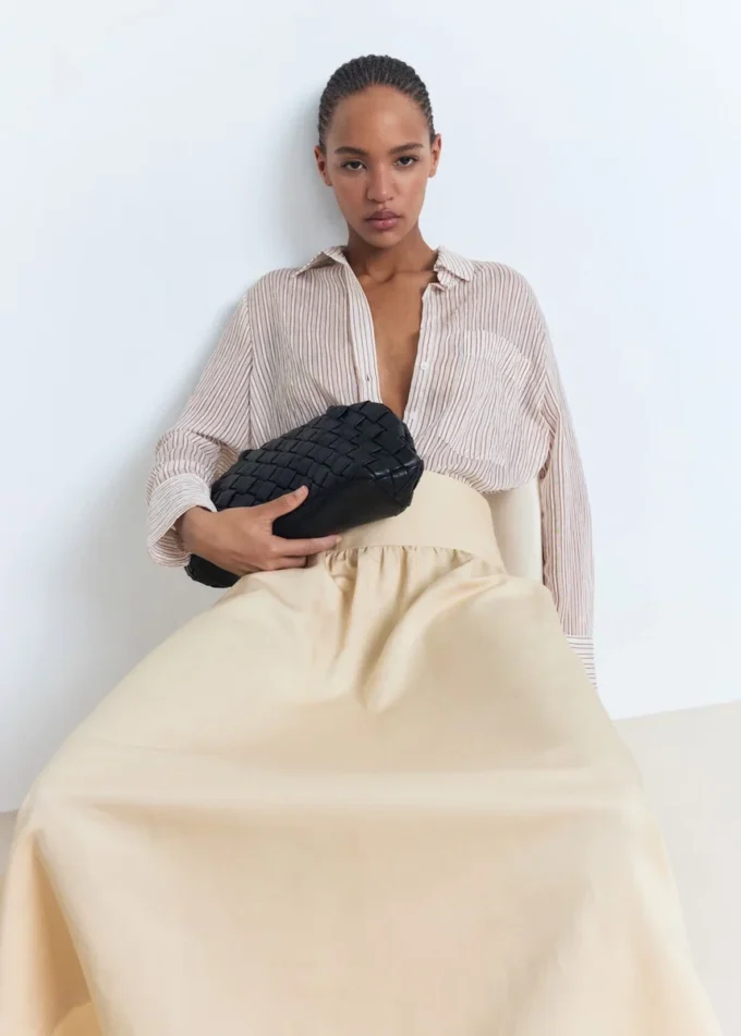 Gonna midi con orlo sfrangiato Gonna midi con orlo sfrangiato