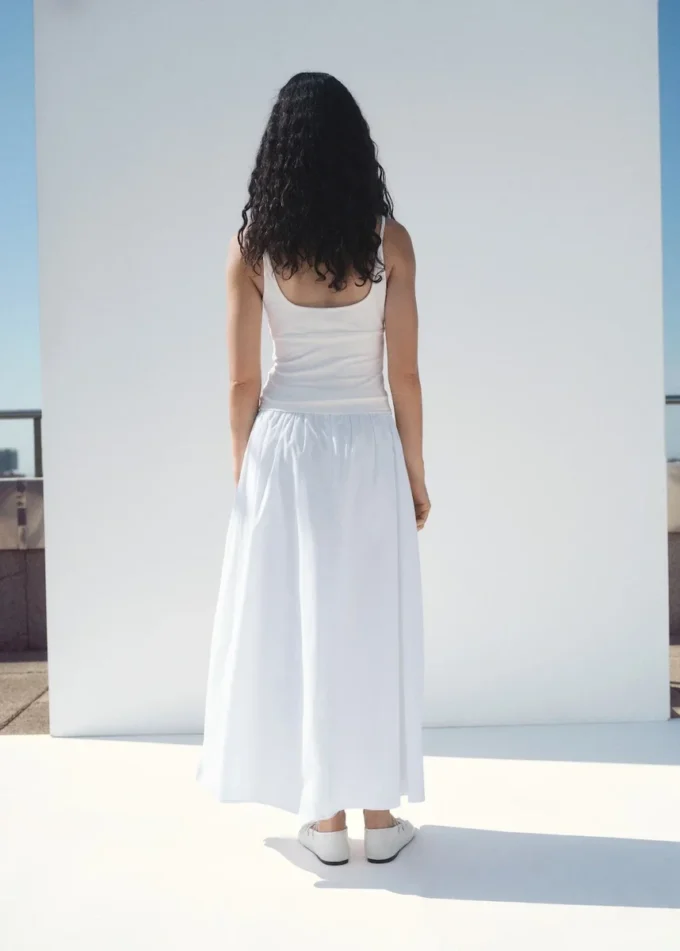 Gonna midi in cotone con pieghe Gonna midi in cotone con pieghe