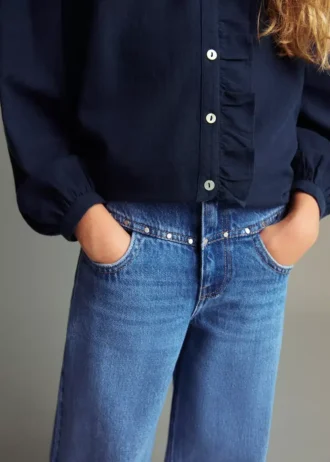 Jeans a gamba larga con borchie