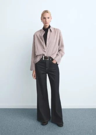 Jeans a gamba larga con bottoni