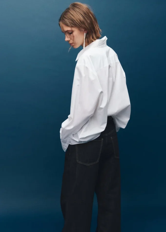 Jeans a gamba larga con bottoni