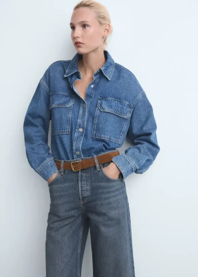 Jeans a gamba larga con bottoni Jeans a gamba larga con bottoni