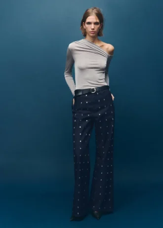 Jeans a gamba larga con cristalli