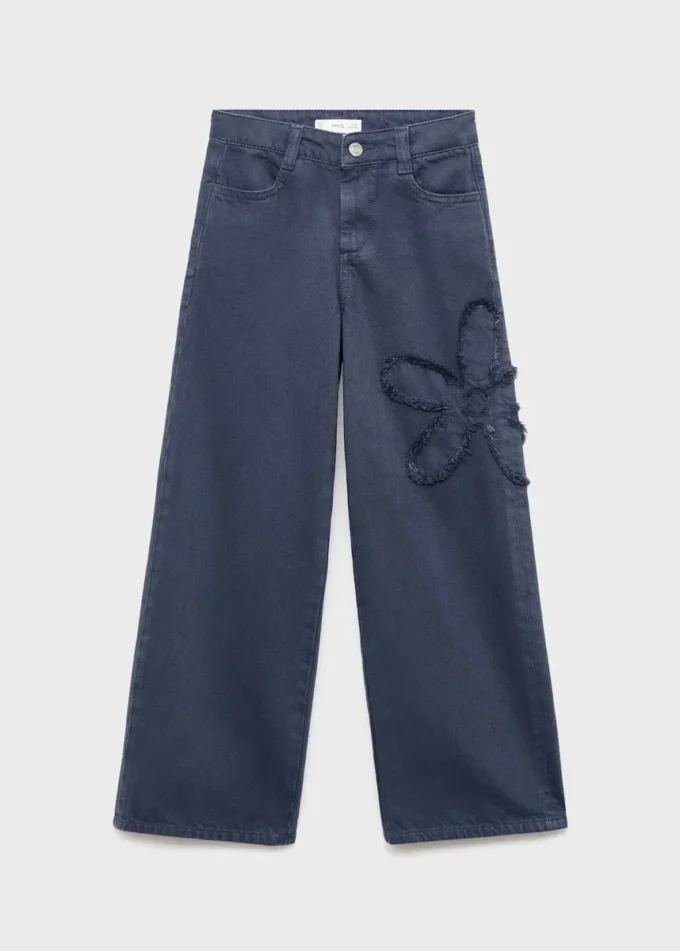 Jeans a gamba larga con dettaglio floreale Jeans a gamba larga con dettaglio floreale