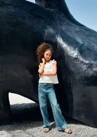 Jeans a gamba larga con orlo risvoltato