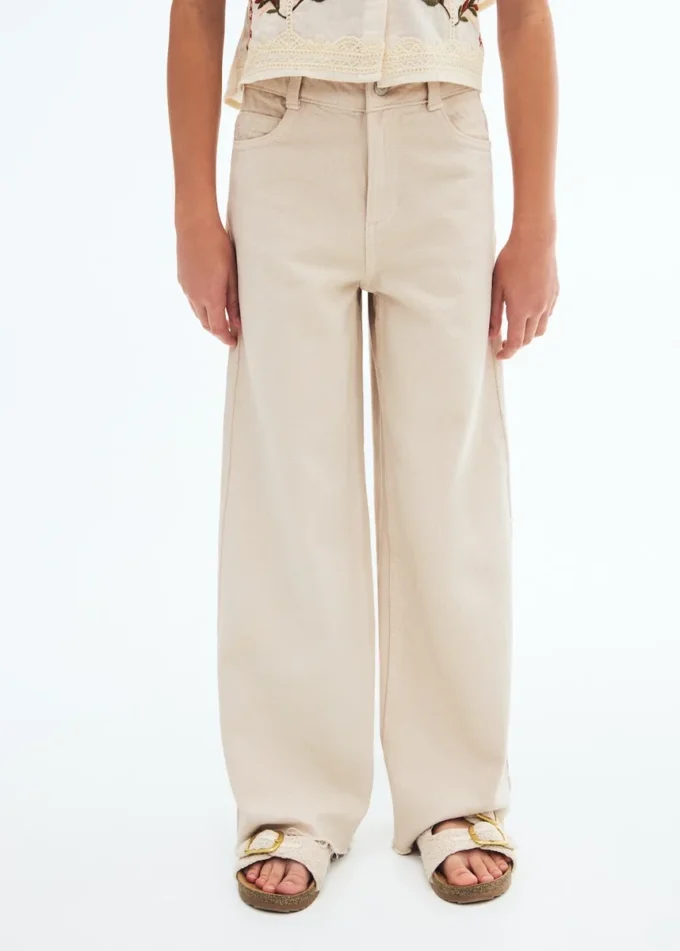 Jeans a gamba larga con orlo sfrangiato