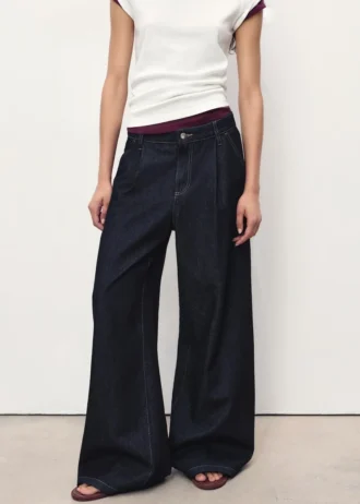 Jeans a gamba larga con piega