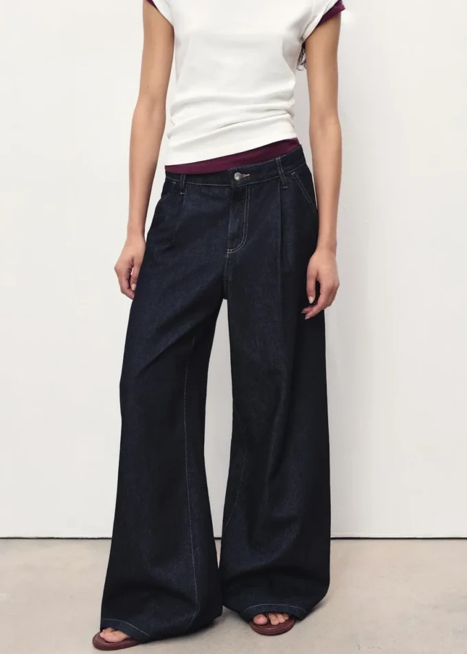 Jeans a gamba larga con piega Jeans a gamba larga con piega