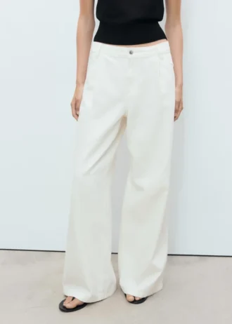 Jeans a gamba larga con piega