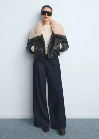 Jeans a gamba larga con piega