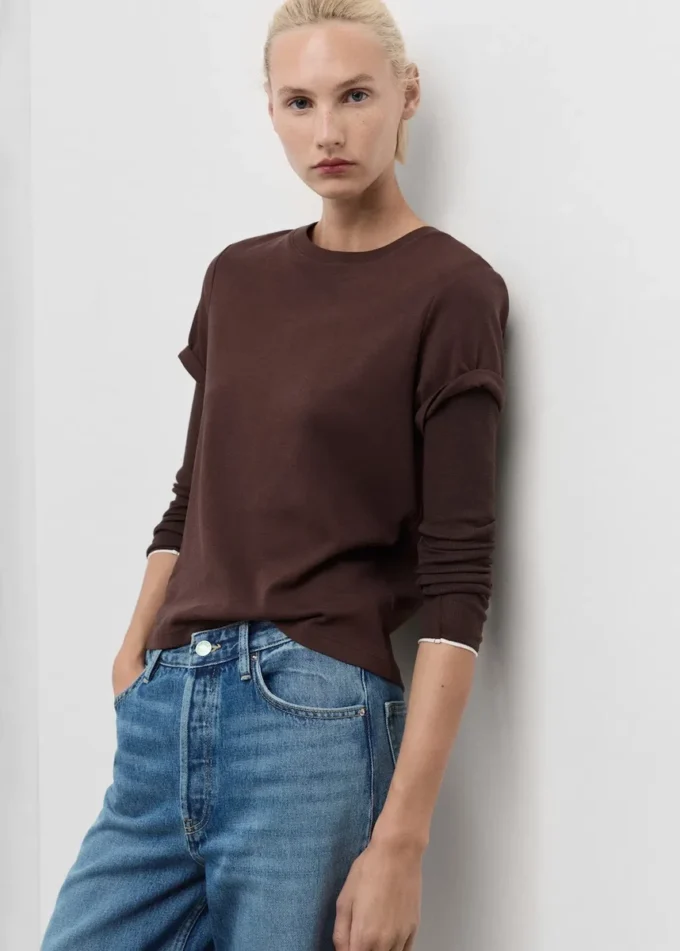 Jeans a gamba larga con risvolto