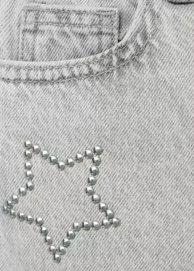 Jeans a gamba larga con stelle Jeans a gamba larga con stelle