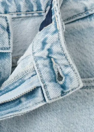 Jeans a gamba larga con tasche a forma di cuore